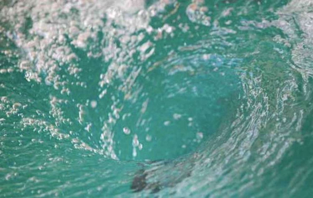 The child had to be rescued by local surfers.