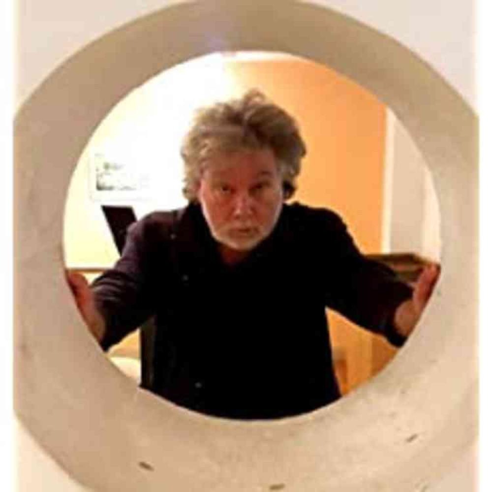 Iain Maitland looking into the portal of a creepy killer's mind