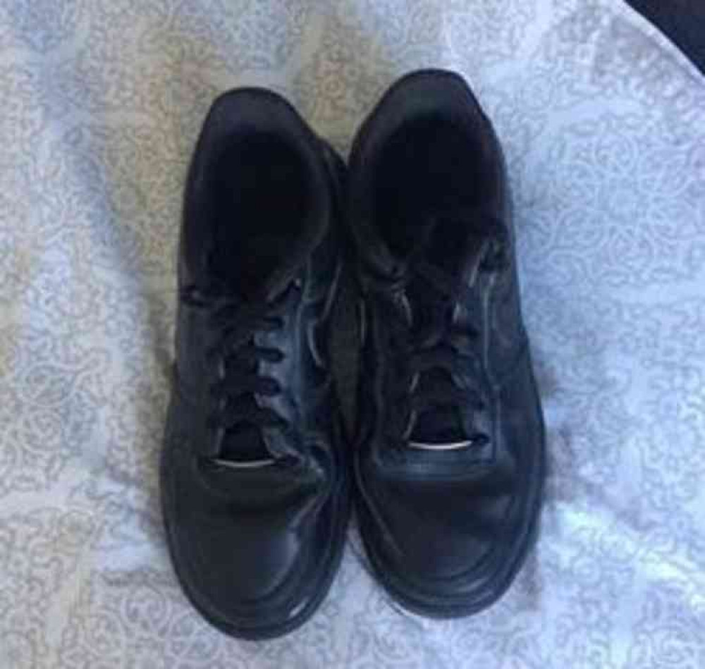 Offending black shoes