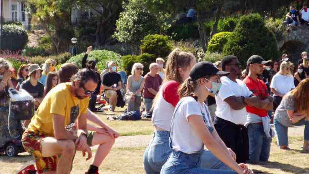 The crowd takes knee for more than eight minutes