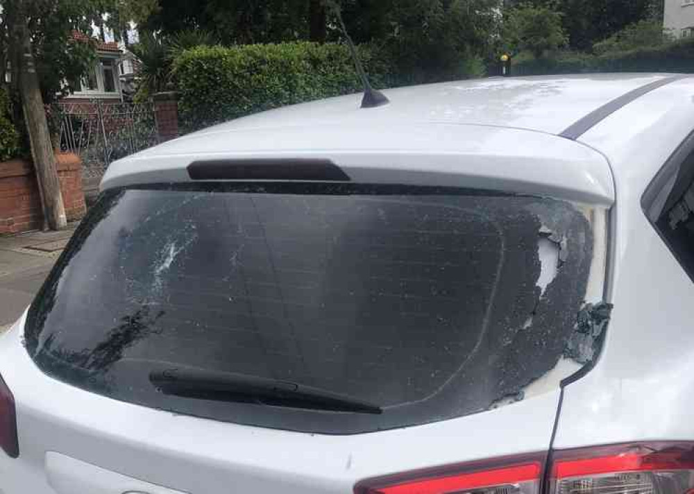 The smashed car window