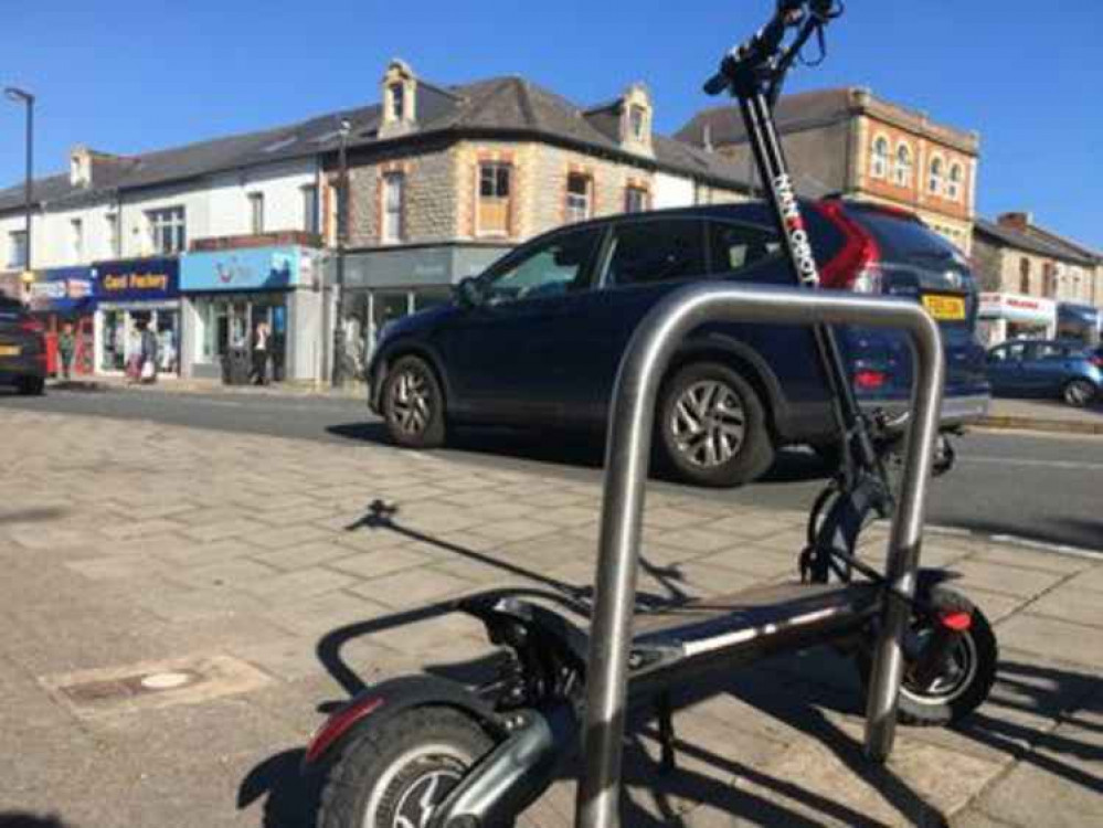 An e-scooter parked on Windsor Road