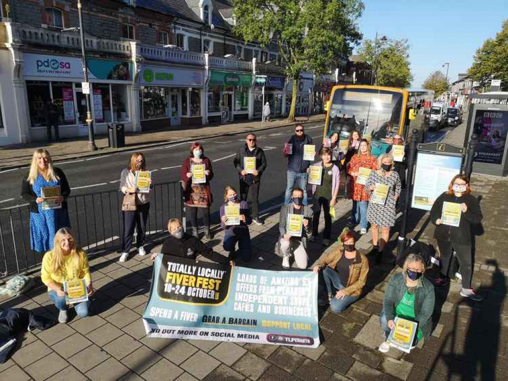 Fiver Fest businesses gather for publicity shot (Photo credit: Griffin Books)