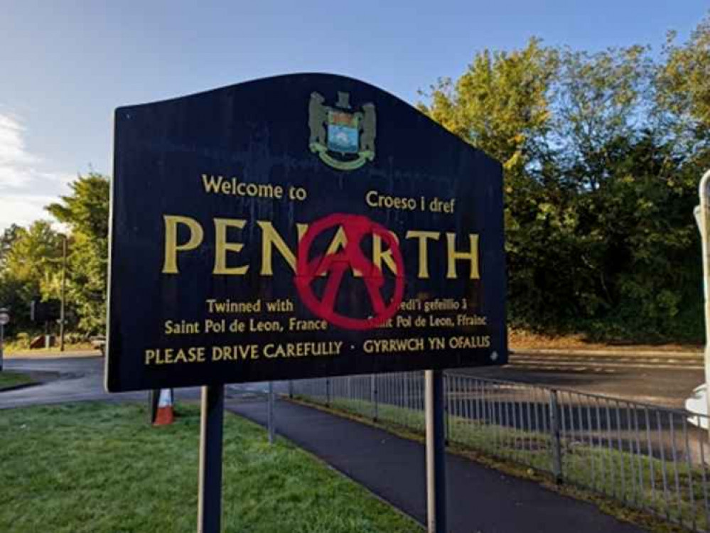 This graffiti has not yet been cleaned from Penarth's gateway sign.