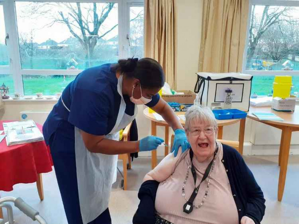 Sheila Pritchard receiving her vaccination