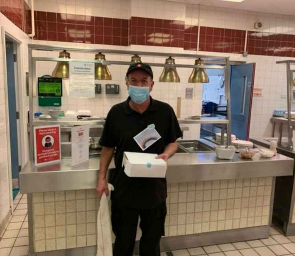 The team have also sent boxes to Llandough Hospital "behind-the-scenes staff". This is hospital kitchen worker Martyn with some treat boxes.