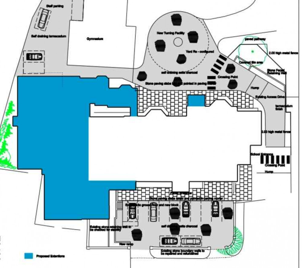 The site plan. The blue area denotes the extension.