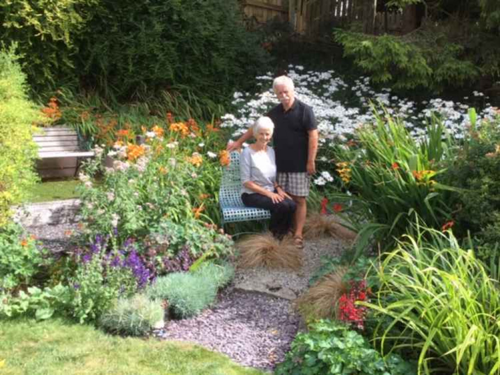 Organisers Jon and Judith Dewis in their garden at Cosmeston Cottage.