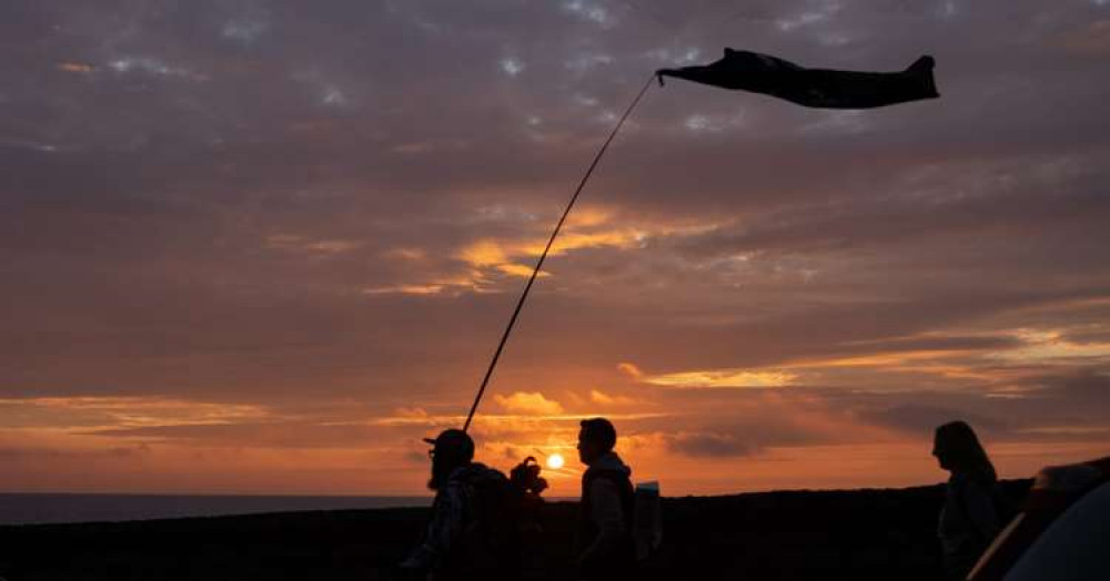 The group walked along the cliff top before heading to the seafront (Image by Aaron Jones)