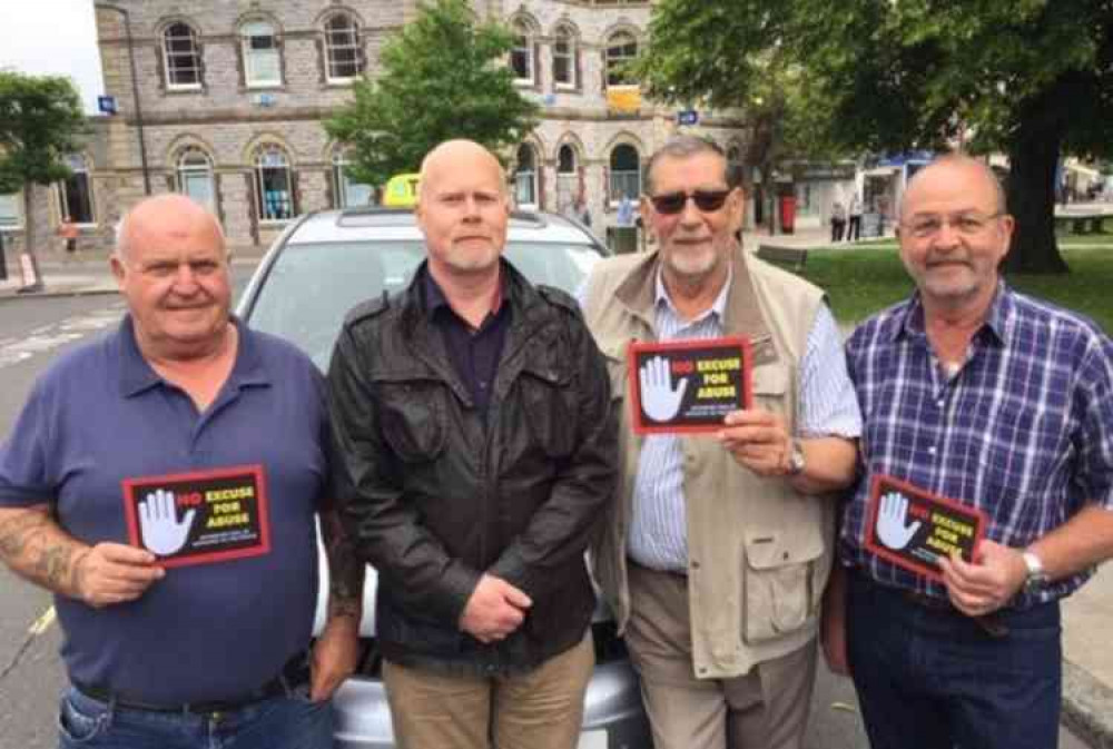 Left to right, Mr AJ Hill (taxi driver), East Devon District Councillor Paul Jarvis, George Shorters (taxi driver) and Charlie Stone (taxi driver)