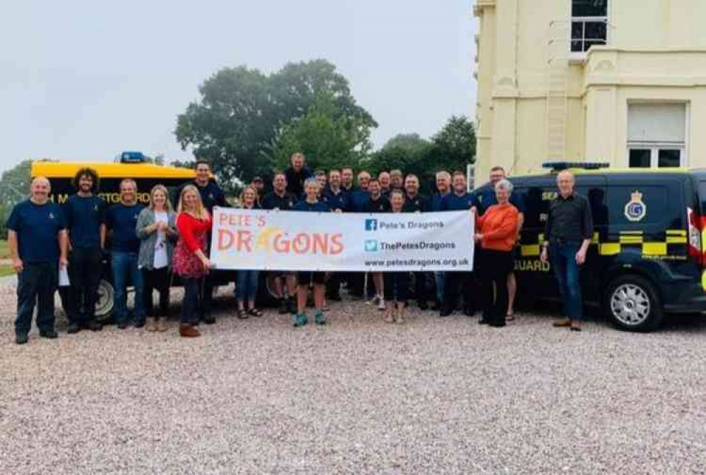 The Pete's Dragons team with members of HM Coastguard.