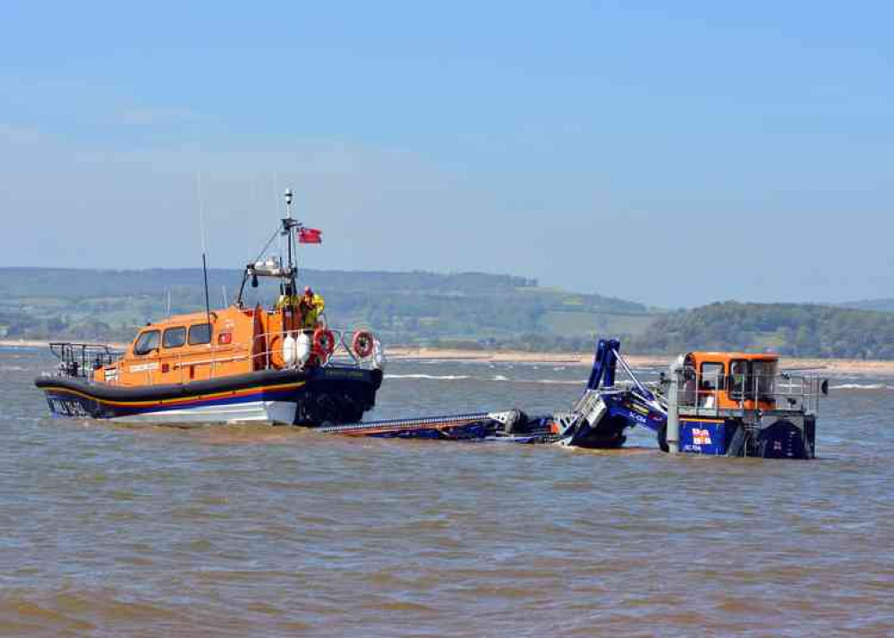 RNLI All Weather Lifeboat R & J Welburn launches to the rescue