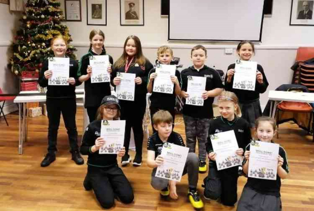 Badgers show off their certificates Badgers show off their certificates