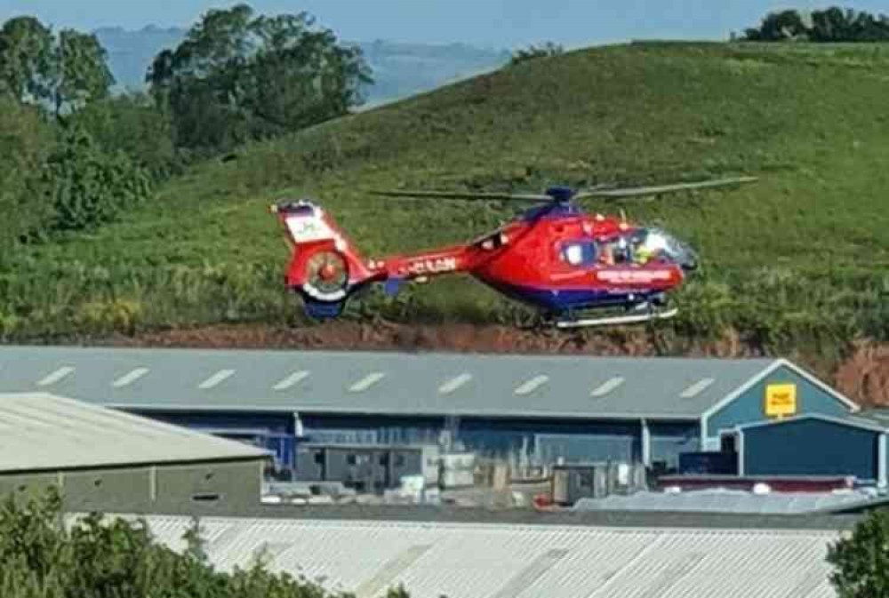 The Devon Air Ambulance arrives at the scene. Image courtesy of Neil Sharland.