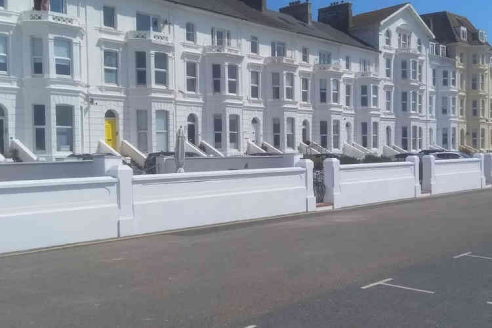 The newly completed wall in front of seafront properties in Exmouth. Image courtesy of Gov.uk.