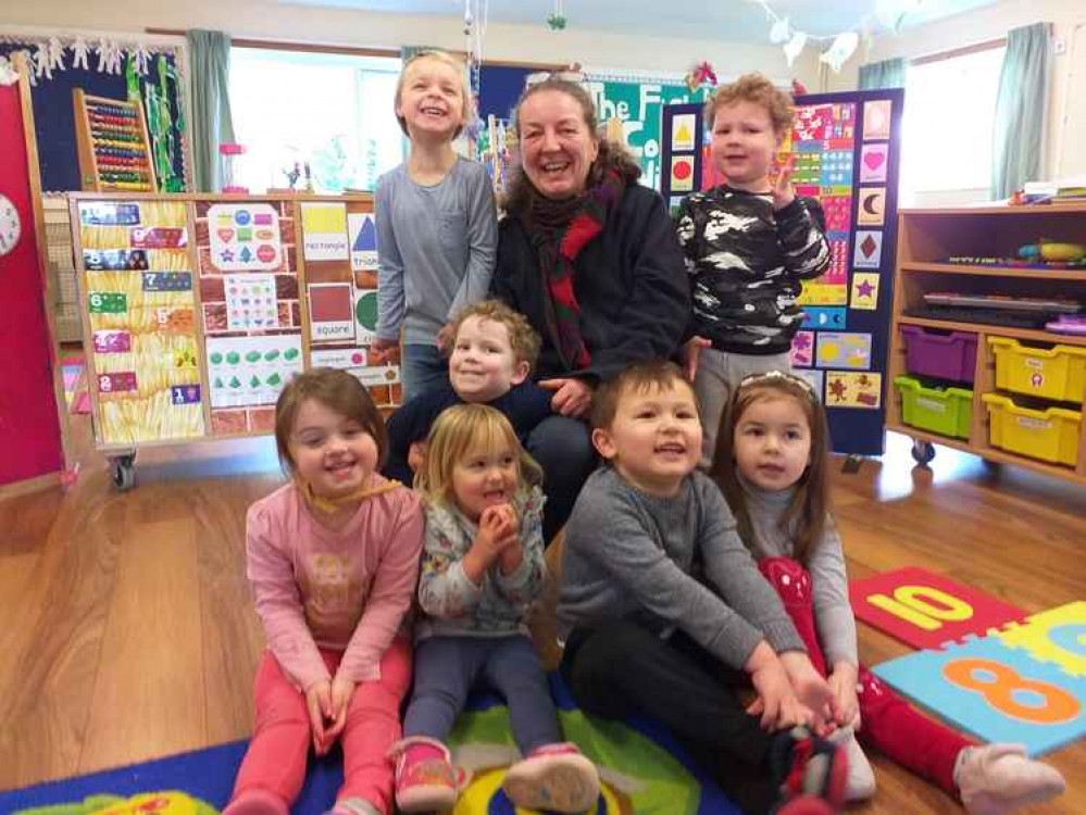 Helena Meineck with some of the children