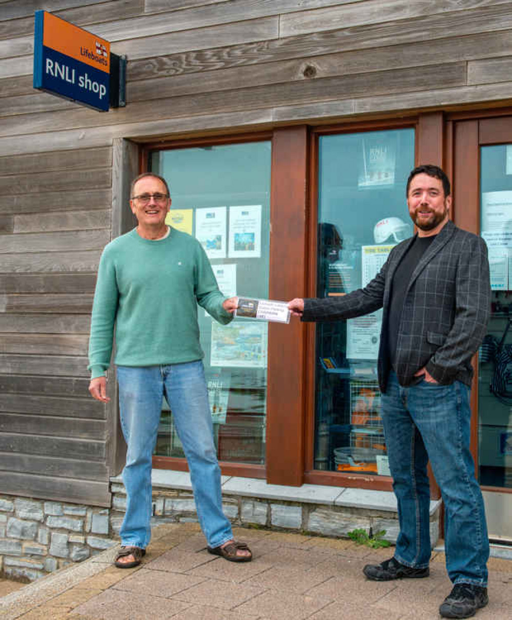 Simon Davidson (L) hands over his official Chair's car parking permit to incoming Chair, Ralf Pearson (R)   Credit : John Thorogood