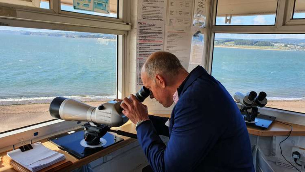 Phil Spencer using equipment inside Coastwatch House. Credit: NCI Exmouth Phil Spencer using equipment inside Coastwatch House. Credit: NCI Exmouth
