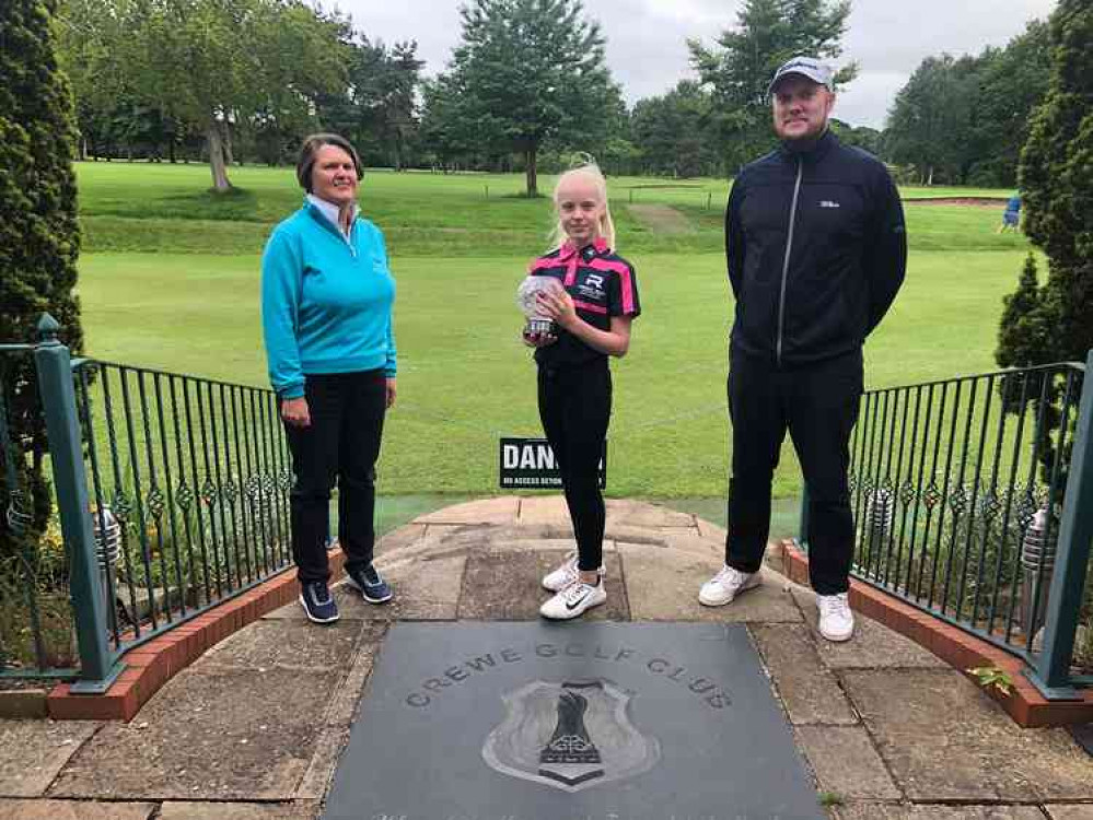 Jamie Hand (centre) with Ladies Club Captain Kay Sampson and dad Gary Hand