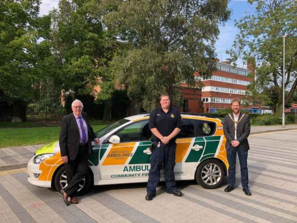 First responder Darren Hall (centre) with Crewe Town Mayor Benn Minshall