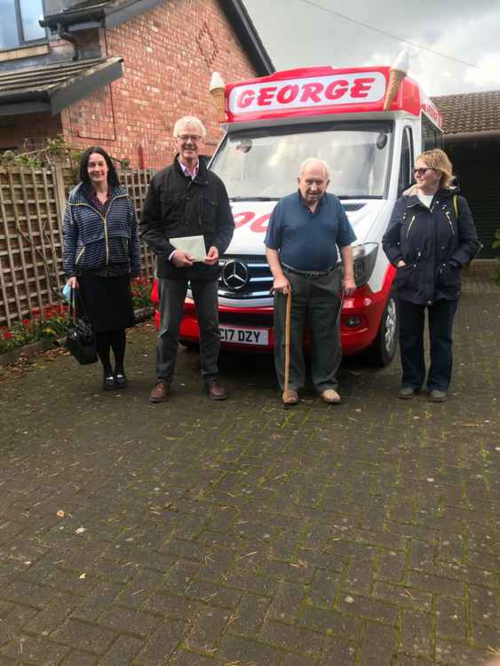 George with Whitby Morrison MD Stuart Whitby (second left). George with Whitby Morrison MD Stuart Whitby (second left).
