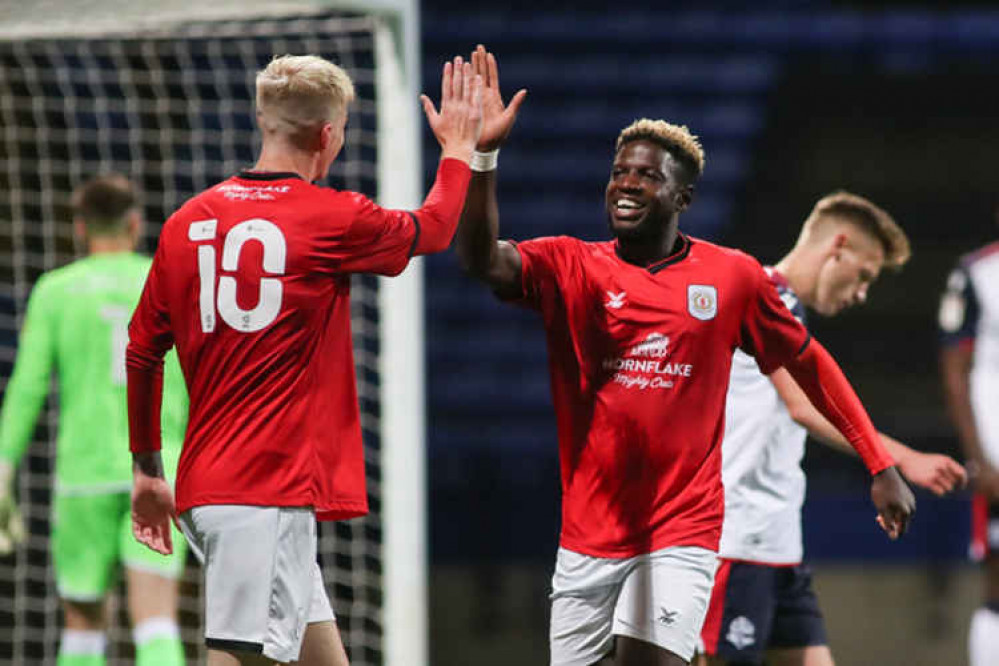 Crewe return to Bolton in the FA Cup - Offrande Zanzala celebrates during August's pre-season game.