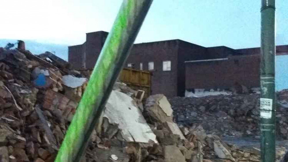 Only piles of rubble remain of the shopping row.