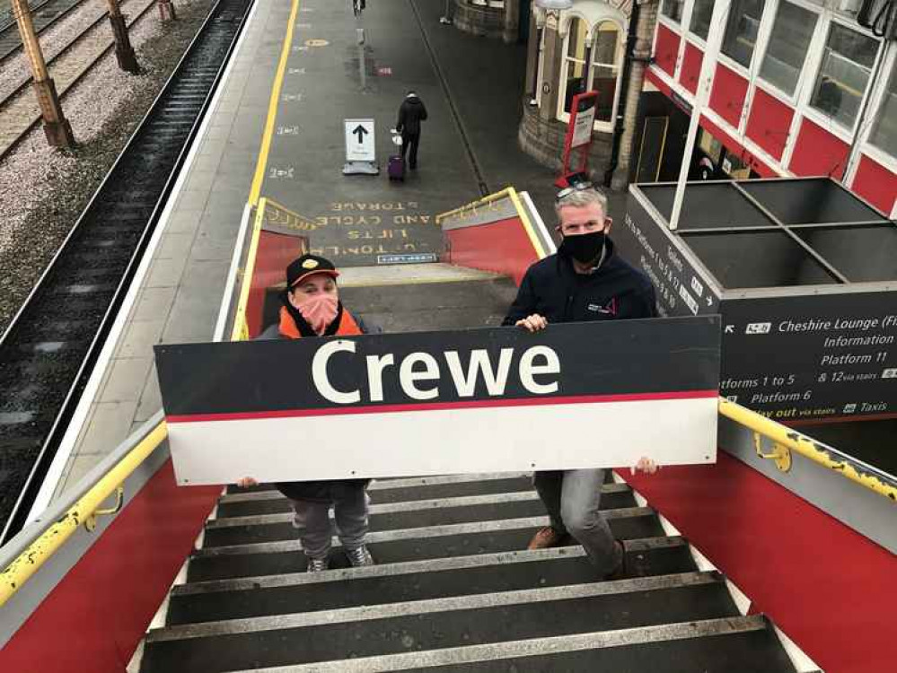 Rachel Cope (left) with her winning sign at Crewe Station.