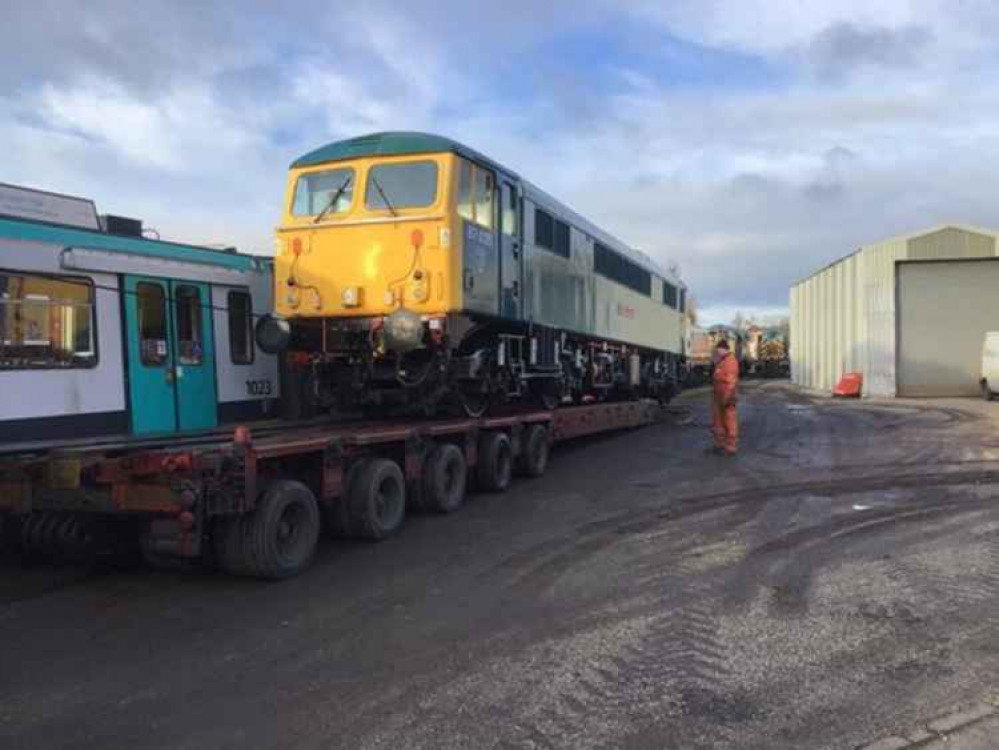 The Class 87 being lifted onto its transport.