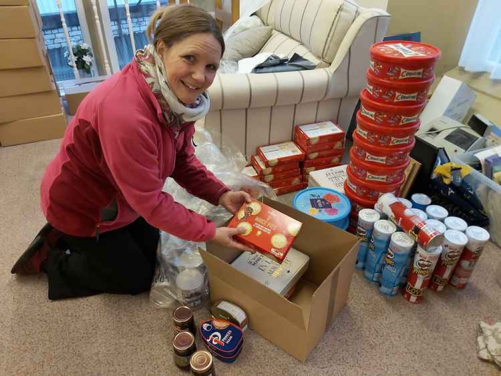 The Christmas parcels get packed up at St. Paul's in Hightown.