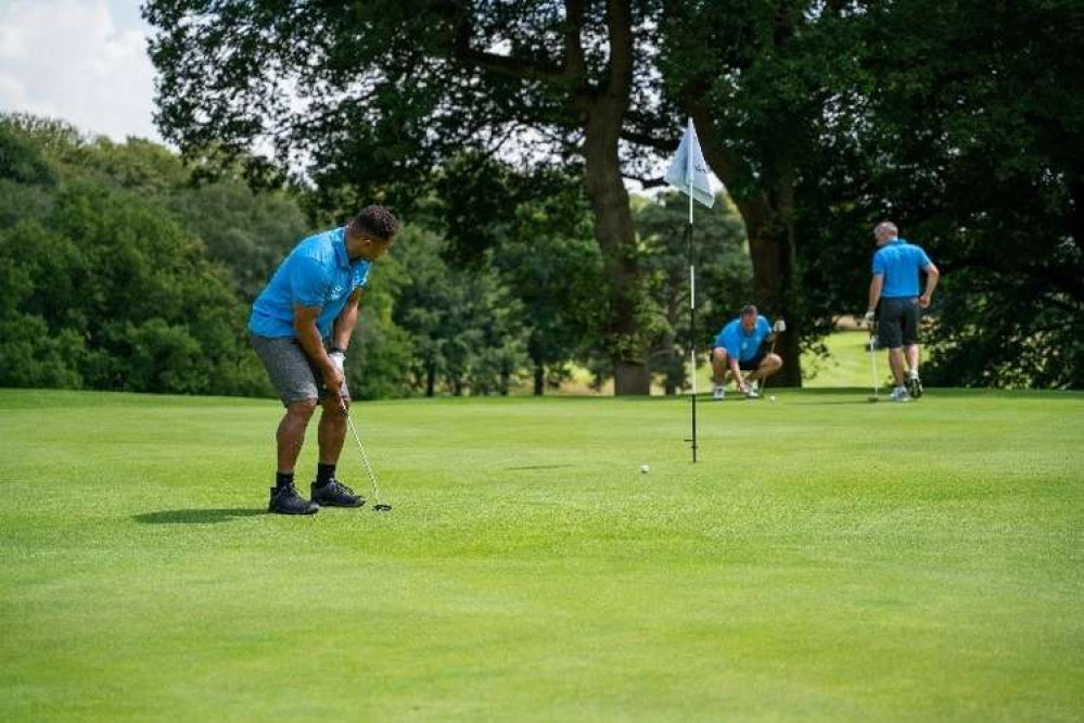 Former England International and Sale Sharks non-executive Director, Jason Robinson, shows off his golf skills.