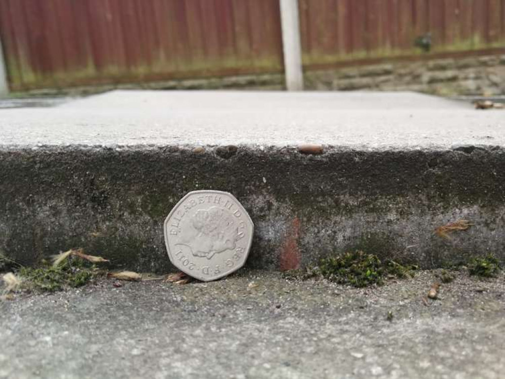 The 50 pence piece demonstrates the movement on Martin Hulme's drive caused by tree subsidence.