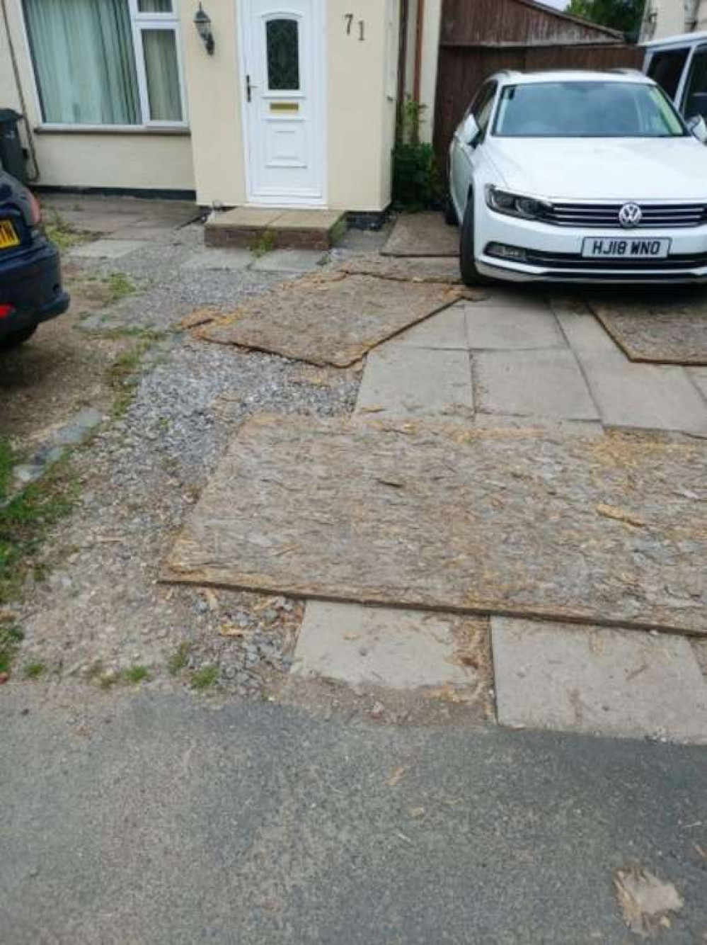 Boardings were placed across Mr Hulme's damaged driveway.