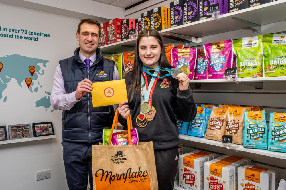 Milly at Mornflake with her clutch of medals 