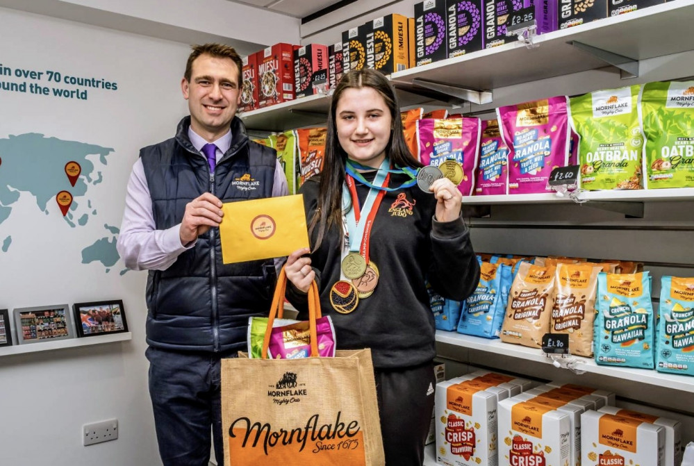 Milly with an impressive array of medals including a gold and silver won at the recent Northern Ireland Open judo competition (Jan Roberts).