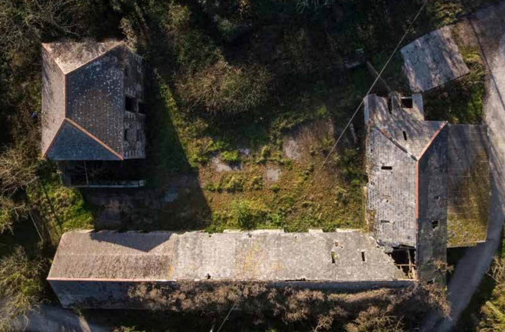 The plans could see these derelict barns revived into holiday lets. Credit: GRAS architects.