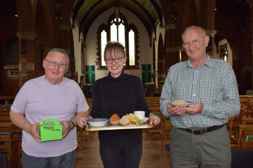 The Rev. Cullens (centre) with Saturday Cafe co-workers at St Andrews Church (Picture: Jonathan White).