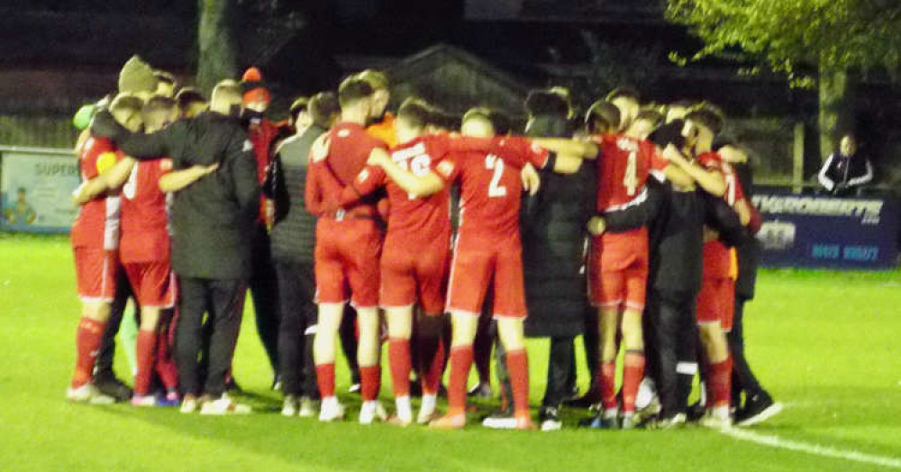 Post match victory huddle