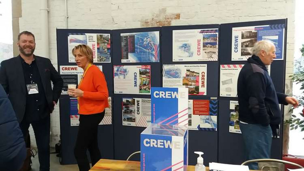 Chairman of Crewe Town Board Doug Kinsman (left) in front of the projects display at Crewe Market Hall. Chairman of Crewe Town Board Doug Kinsman (left) in front of the projects display at Crewe Market Hall.