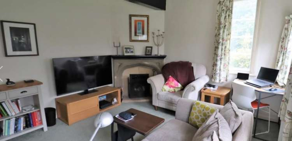 The lounge has a beamed ceiling and an open fire. The lounge has a beamed ceiling and an open fire.