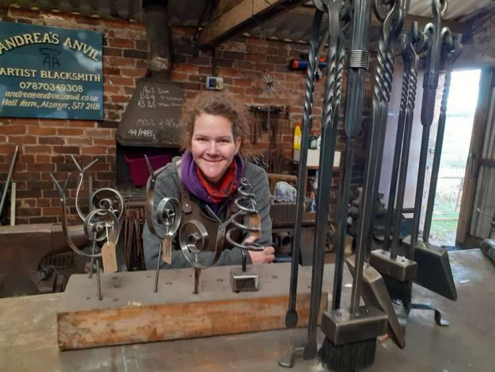 Andrea Hughes in her forge with some of her impressive work