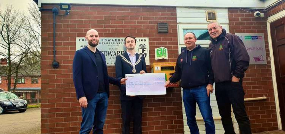 Defibrillator cheque presentation to Alsager Cricket Club in Fairview Avenue  (Photo: Alsager Cricket Club)