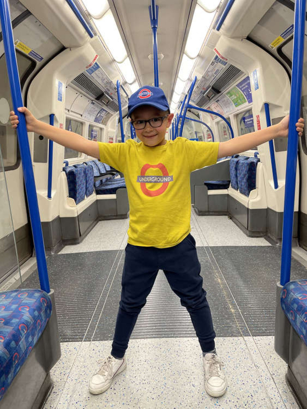 Lewis, now aged 6, has completed his tour of all the tube stations (credit: SWNS)