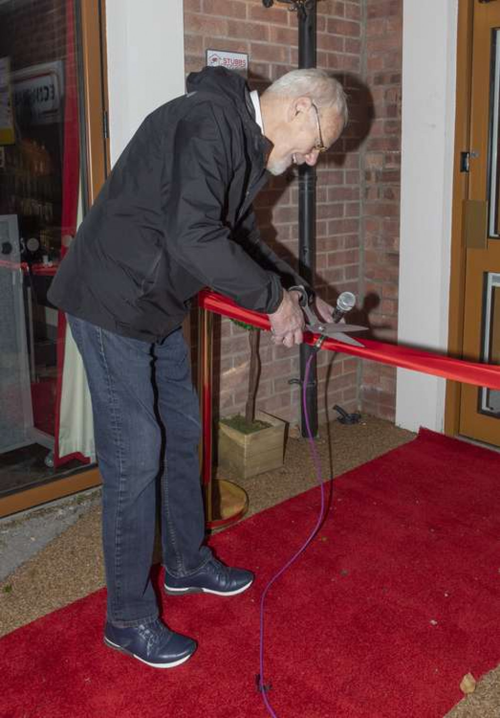 Bob Harris OBE cutting the ribbon