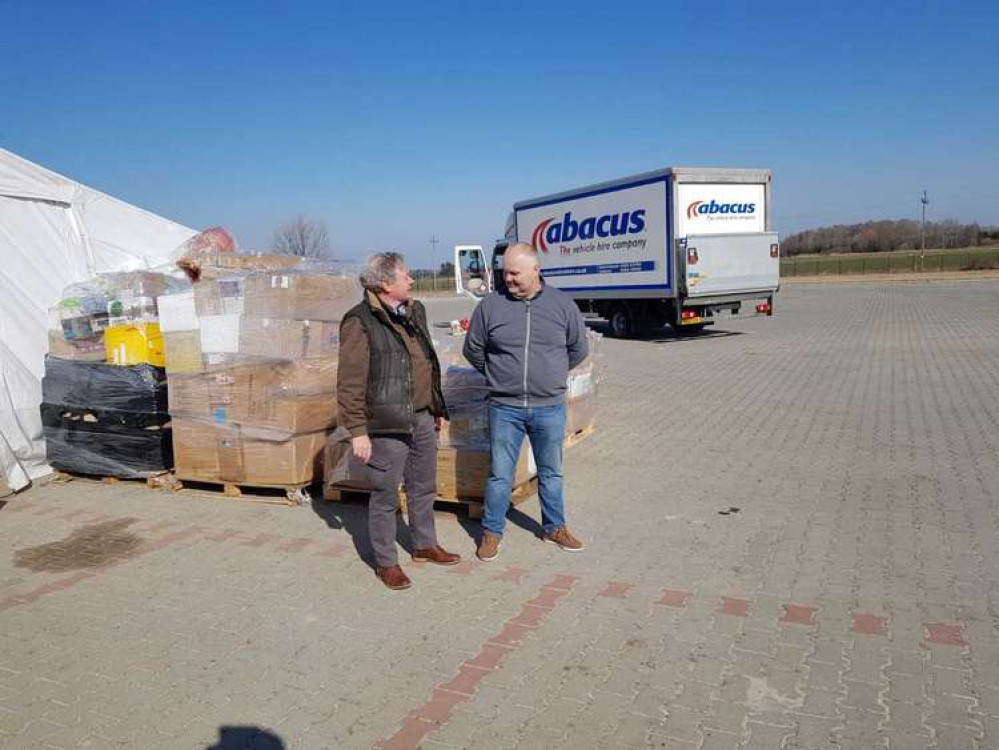 Paul Wallis and Tomek, a volunteer fireman, who unloaded the Dorset aid at the border (Image: Paul Wallis/ Jorj Kowszun)