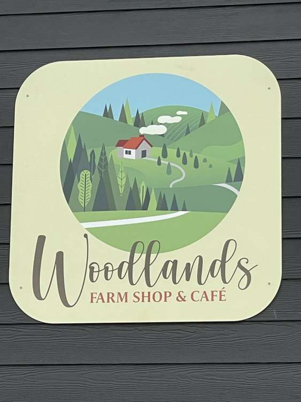 Woodlands Farm shop logo sign