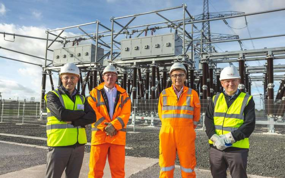Zac Richardson, second left, has stated no third pylons route planned (Picture credit: National Grid)