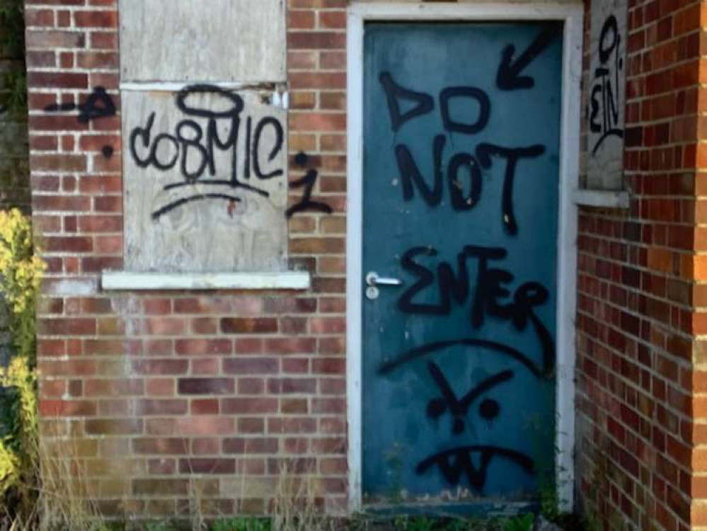 Boarded up Corks Lane (Picture contributed)