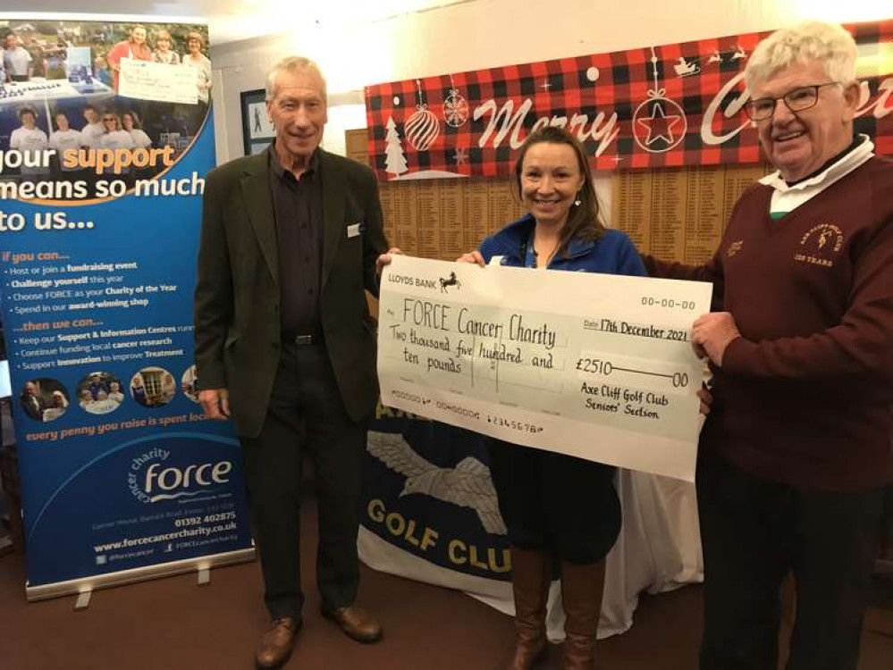 John Hanna, on the right, presenting the cheque to Geoff Clode and  Naomi Cole from FORCE. Photo by Brian Thompson