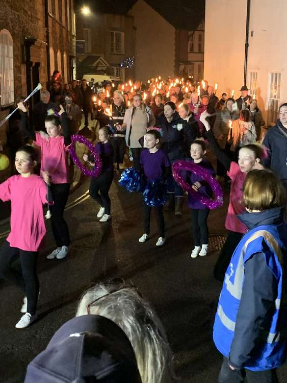 The Karizma Majorettes led the torchlight procession around the town The Karizma Majorettes led the torchlight procession around the town